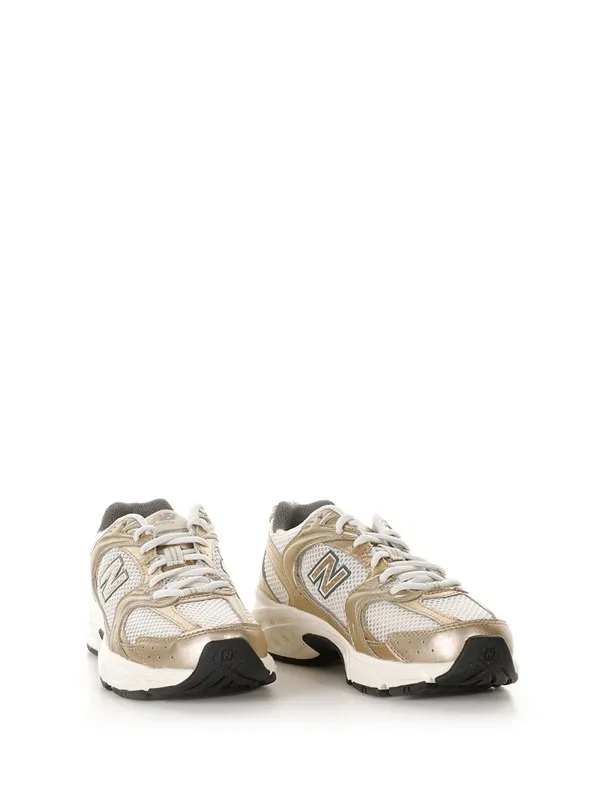 MR530 women's gold sneaker