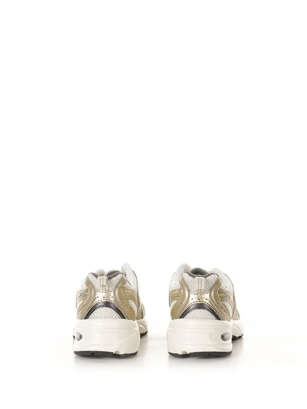 MR530 women's gold sneaker