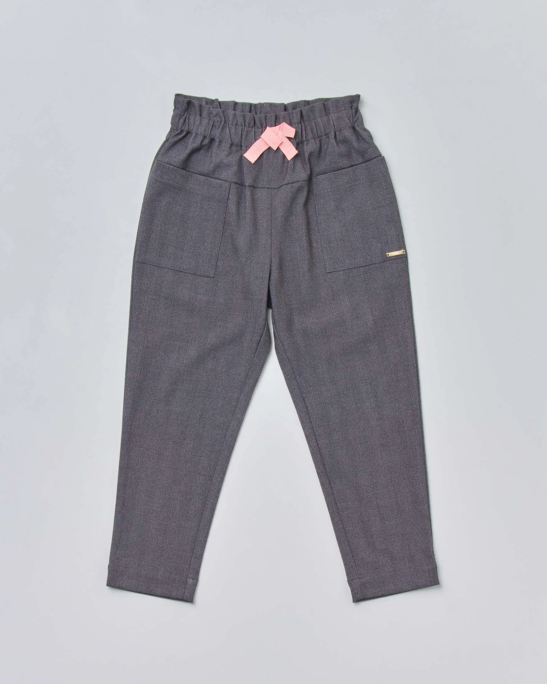 Pantalone grigio baggy in tessuto stretch con tasconi e fiocco rosa 3-7 anni